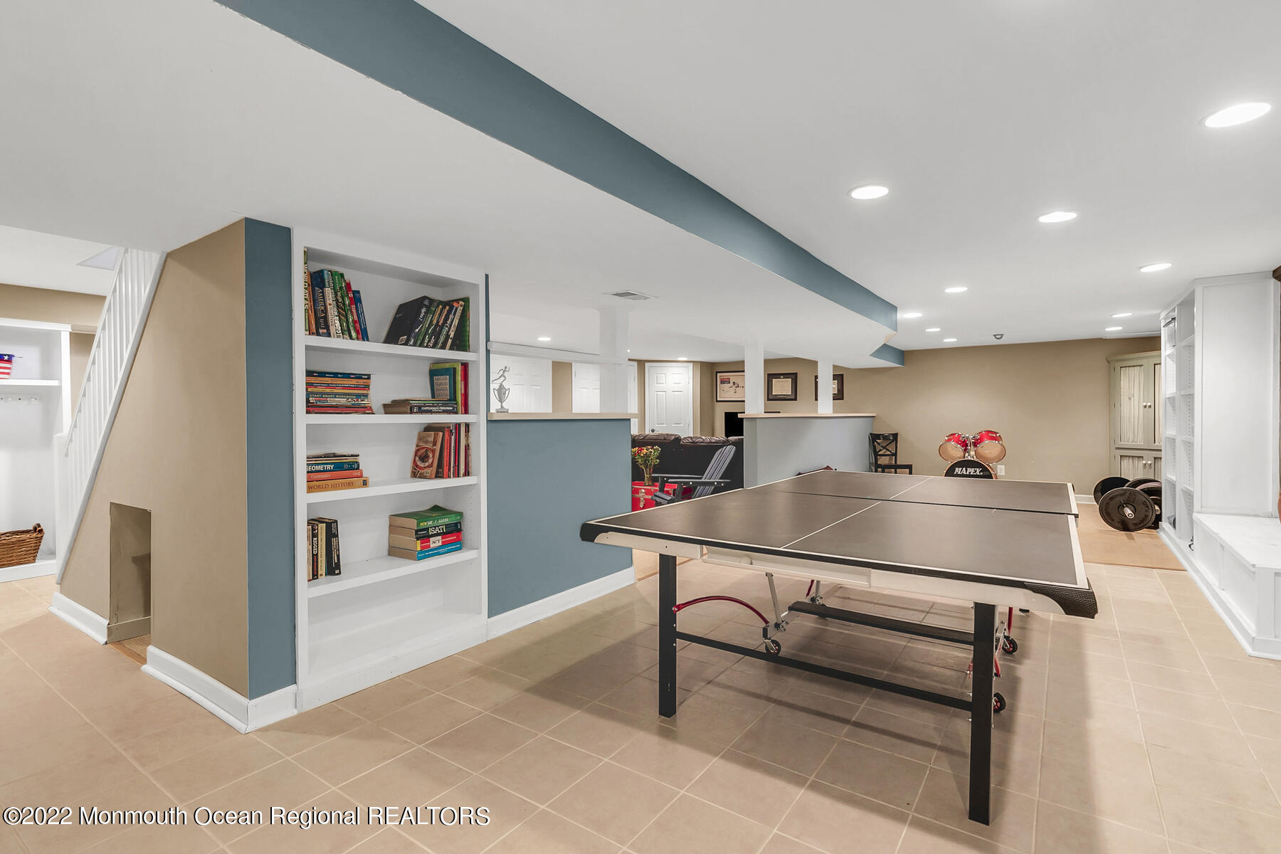 25 Spring Garden Avenue Colts Neck, NJ 07722 - Photo 38 of 58 a living room with furniture and a table