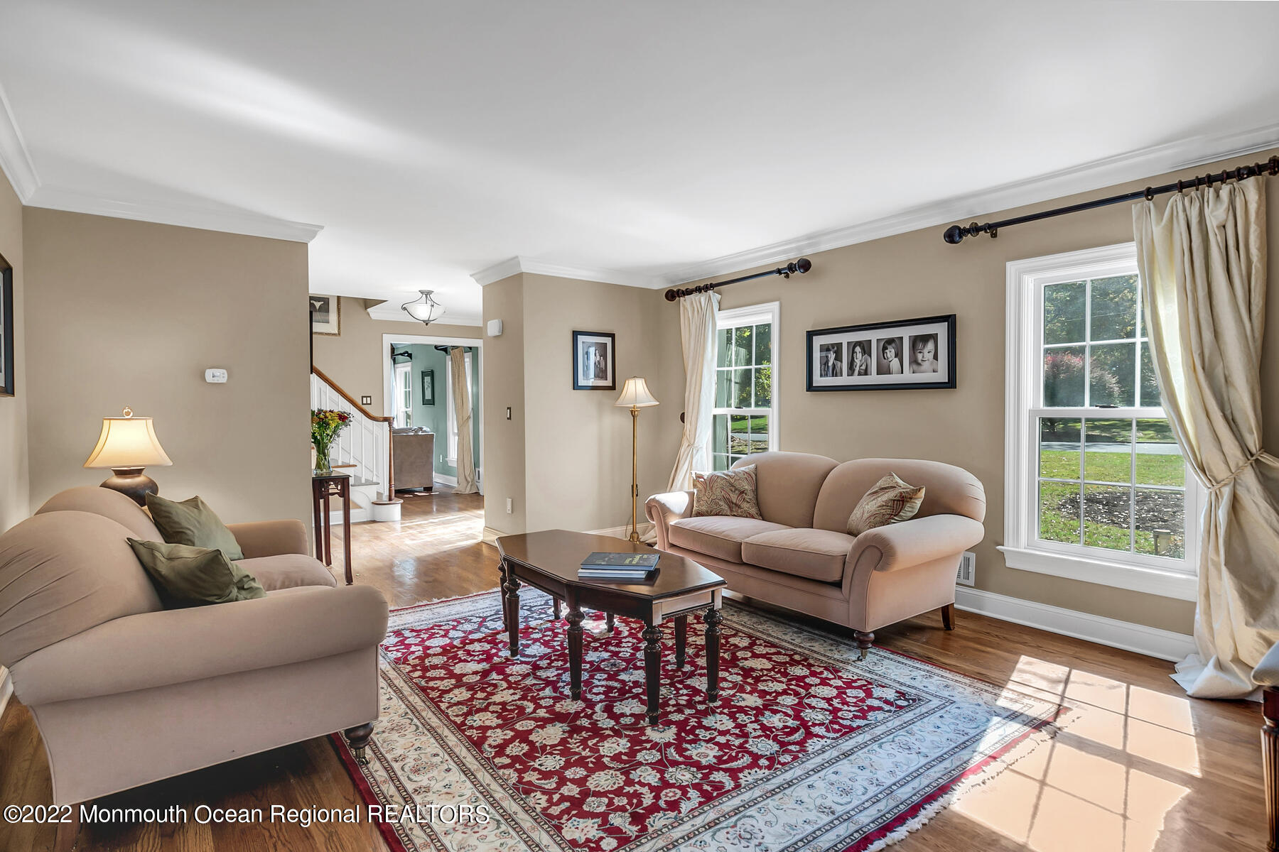 25 Spring Garden Avenue Colts Neck, NJ 07722 - Photo 5 of 58 a living room with furniture and a rug