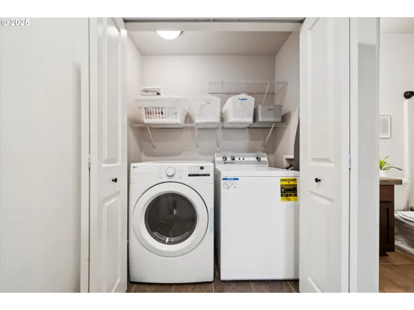 a bathroom with a sink a mirror and a shower