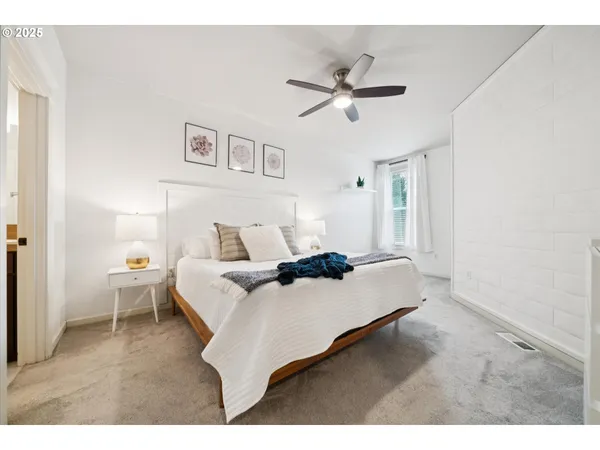 a en suite bathroom with a sink and a mirror