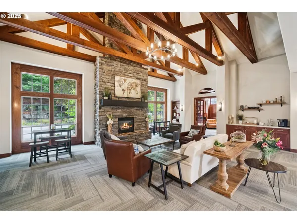a kitchen with a sink and a large mirror