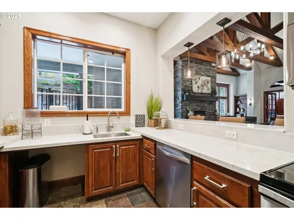 a view of a dinning table and chairs in the patio
