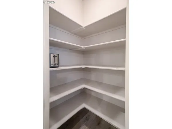 a kitchen with a sink stove and refrigerator