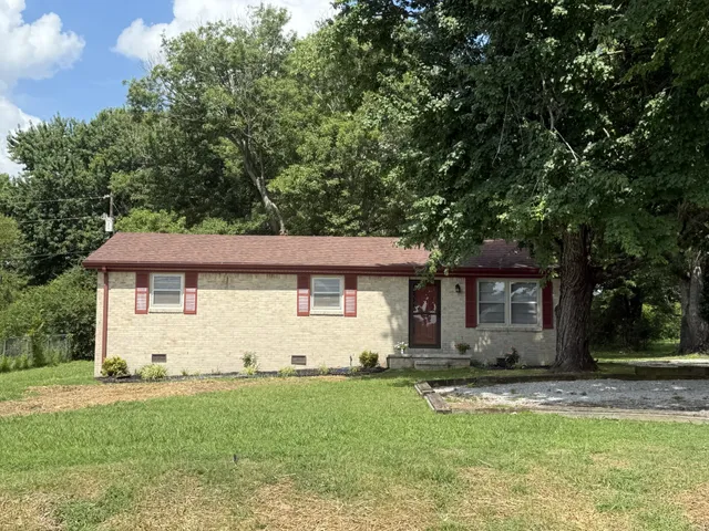 a front view of house with yard