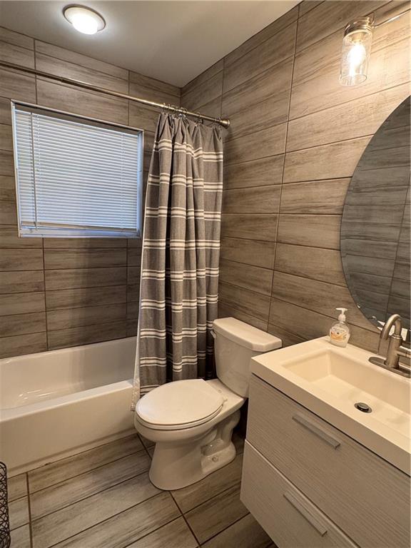 1485 Janmar Drive Decatur, GA 30032 - Photo 30 of 34 a bathroom with a toilet a sink and shower