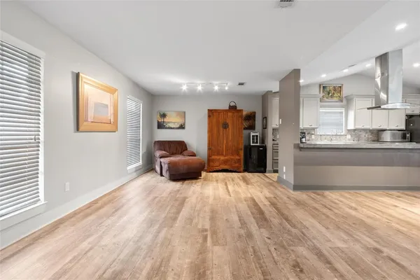 a living room with furniture and a window