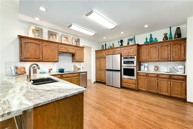 $615,000 | 6122 Northeast Upper Wood Road, Lee's Summit, MO 64064