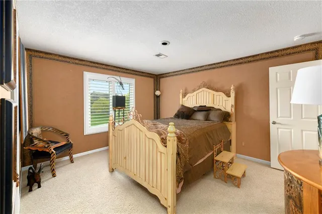 $615,000 | 6122 Northeast Upper Wood Road, Lee's Summit, MO 64064