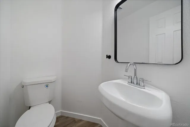 a view of staircase with white walls