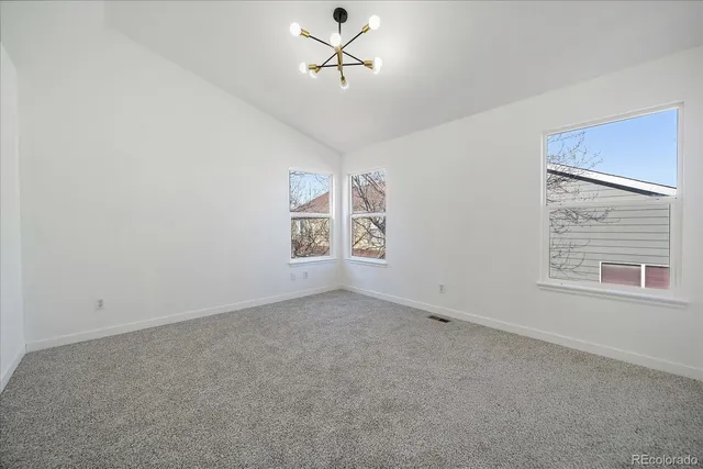 a bathroom with a bath tub with a shower
