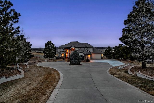 a view of a street with a building in the background