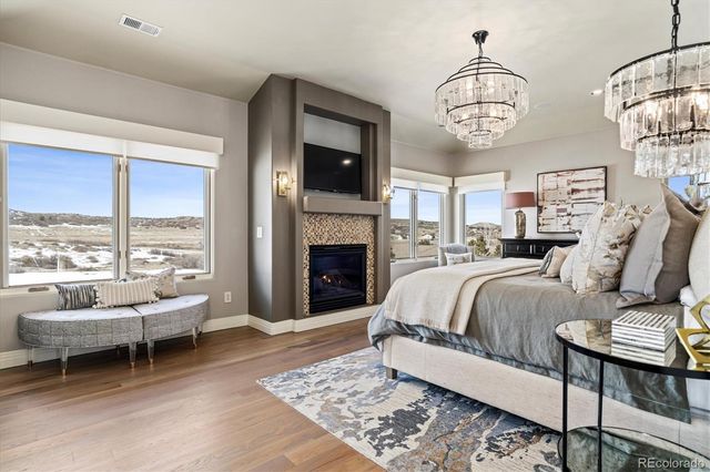 a spacious bedroom with a bed and window