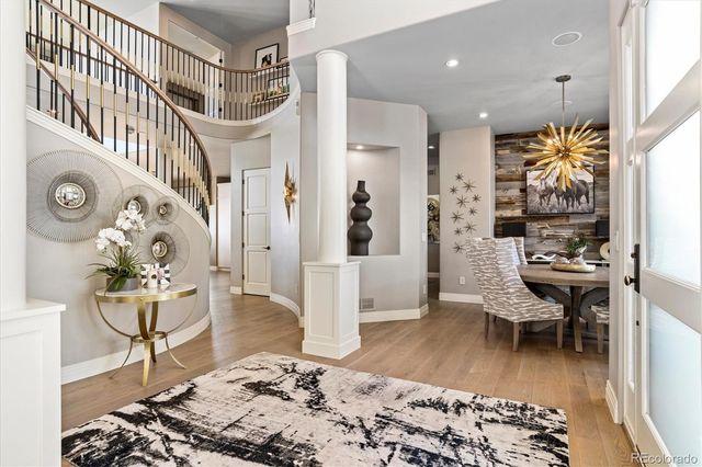 a living room with furniture and a rug
