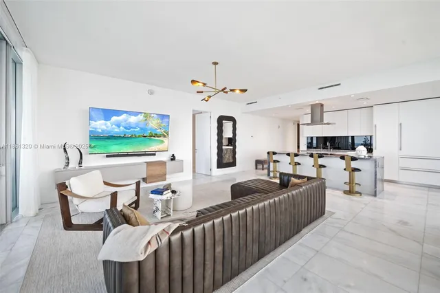 a kitchen with a sink counter top space appliances and cabinets