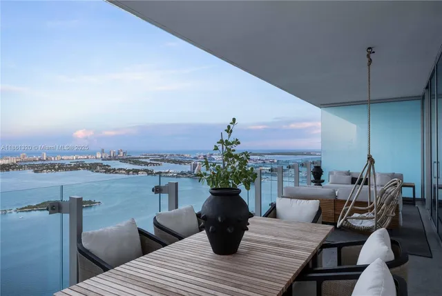 an aerial view of beach and city