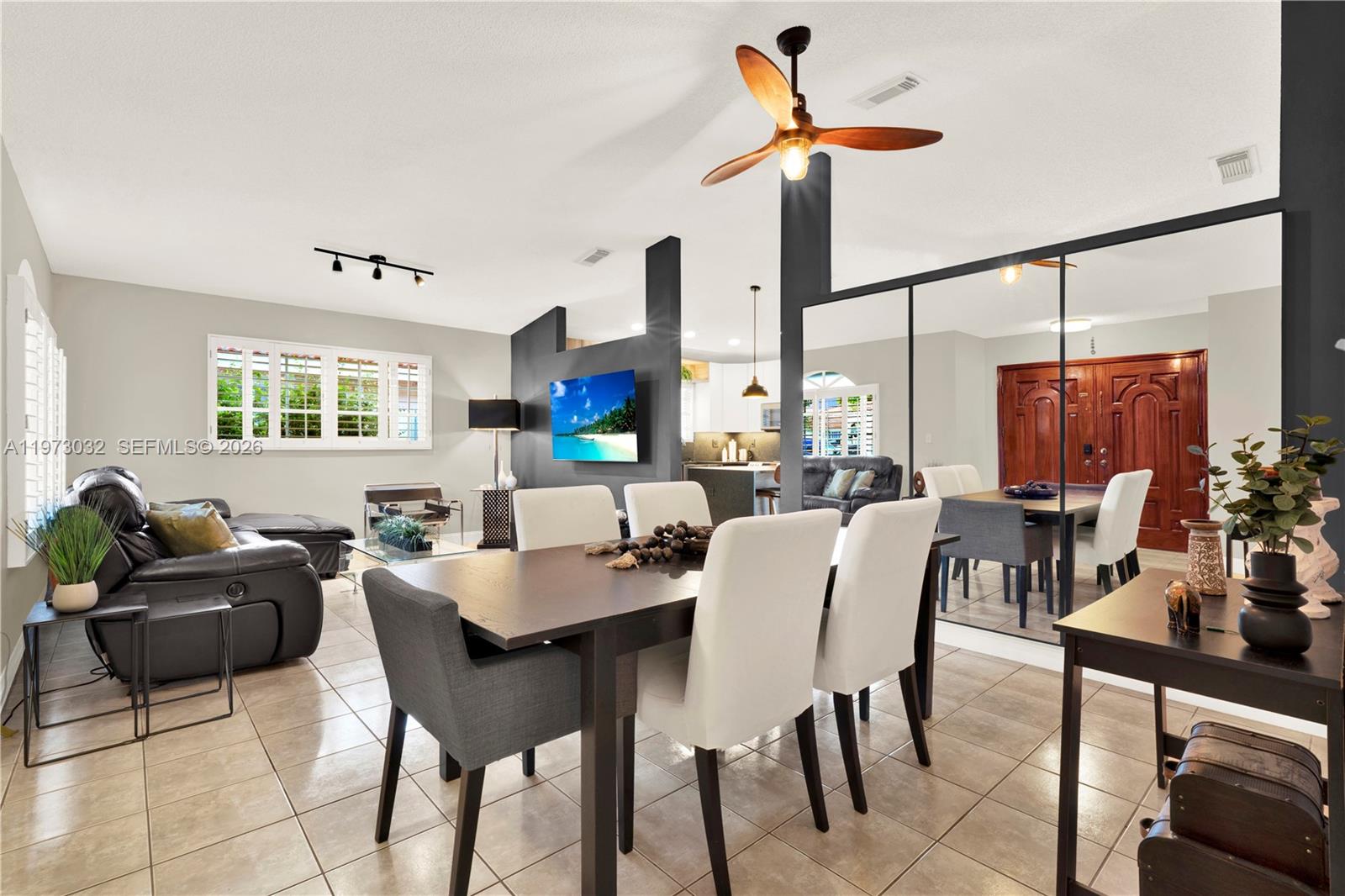 16269 Southwest 78th Terrace Miami, FL 33193 - Photo 11 of 45 a view of a dining room with furniture