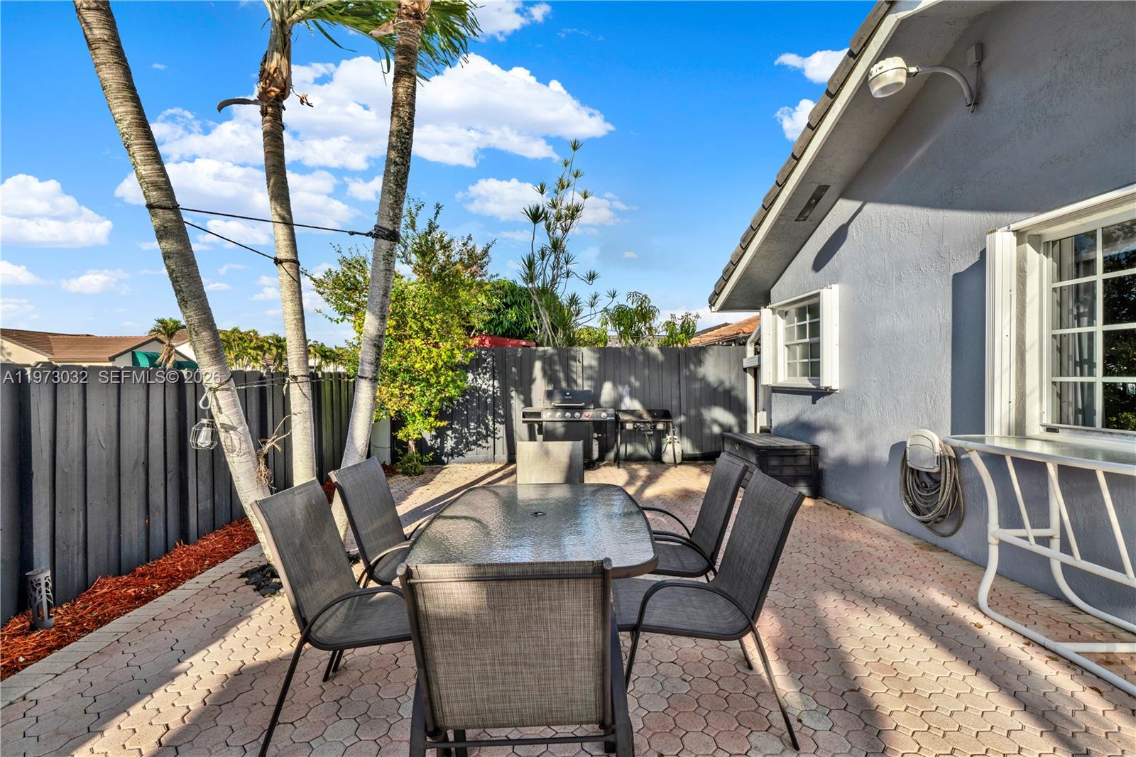 16269 Southwest 78th Terrace Miami, FL 33193 - Photo 28 of 45 a view of an outdoor space with seating area