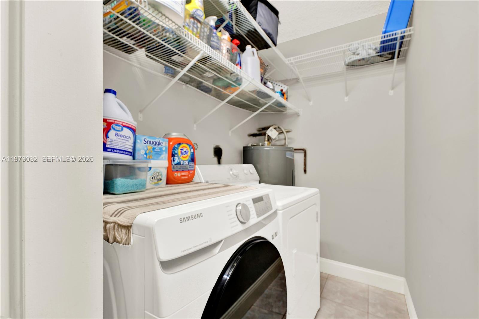 16269 Southwest 78th Terrace Miami, FL 33193 - Photo 31 of 45 a utility room with dryer and washer