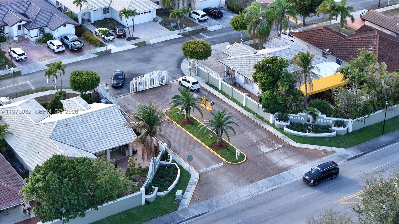 16269 Southwest 78th Terrace Miami, FL 33193 - Photo 41 of 45 an aerial view of a house with garden space and lake view