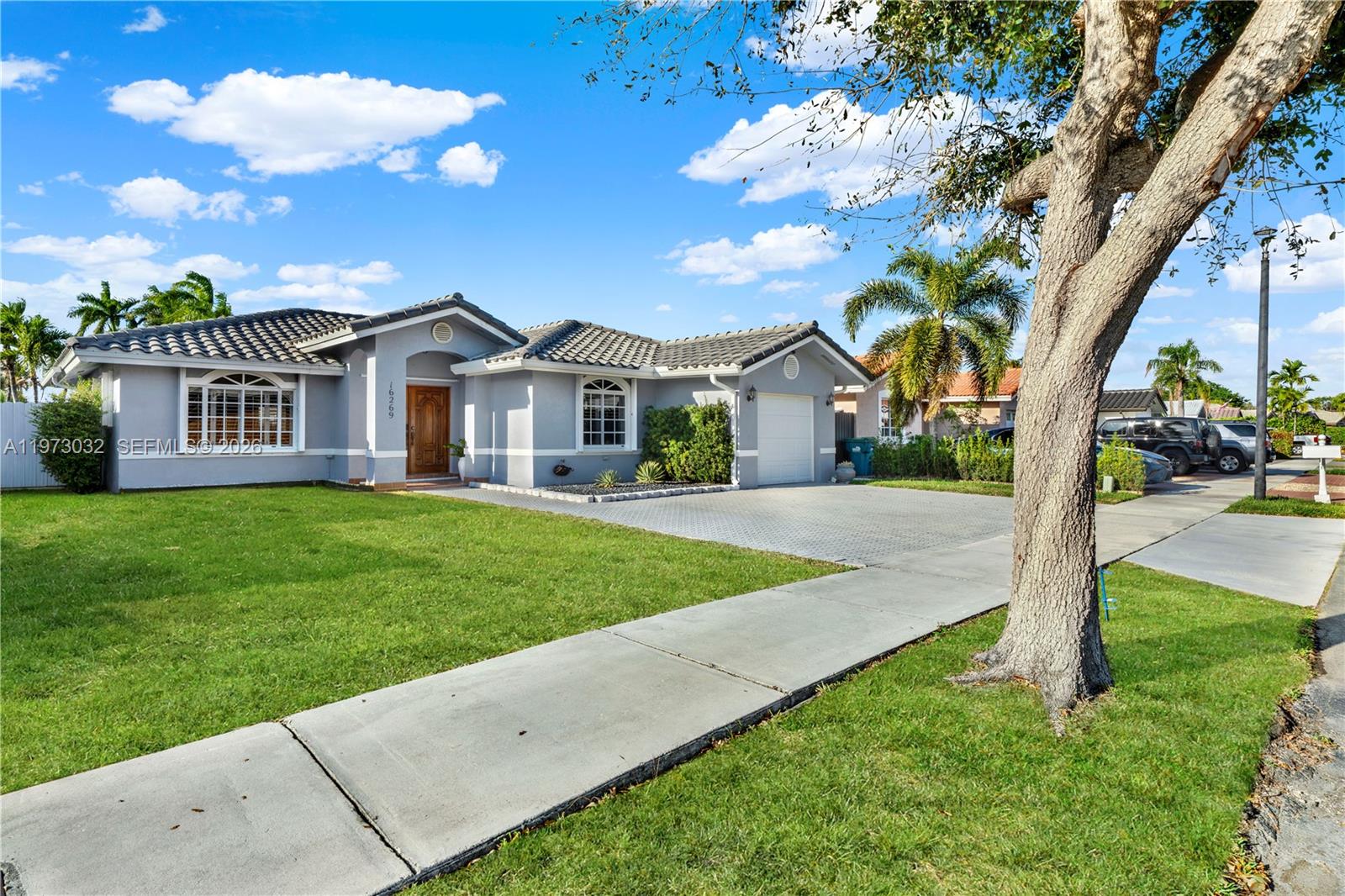 16269 Southwest 78th Terrace Miami, FL 33193 - Photo 43 of 45 a view of house with a garden