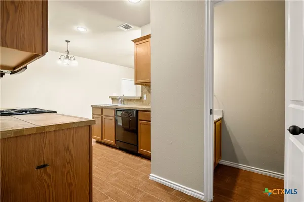 a utility room with washer and dryer