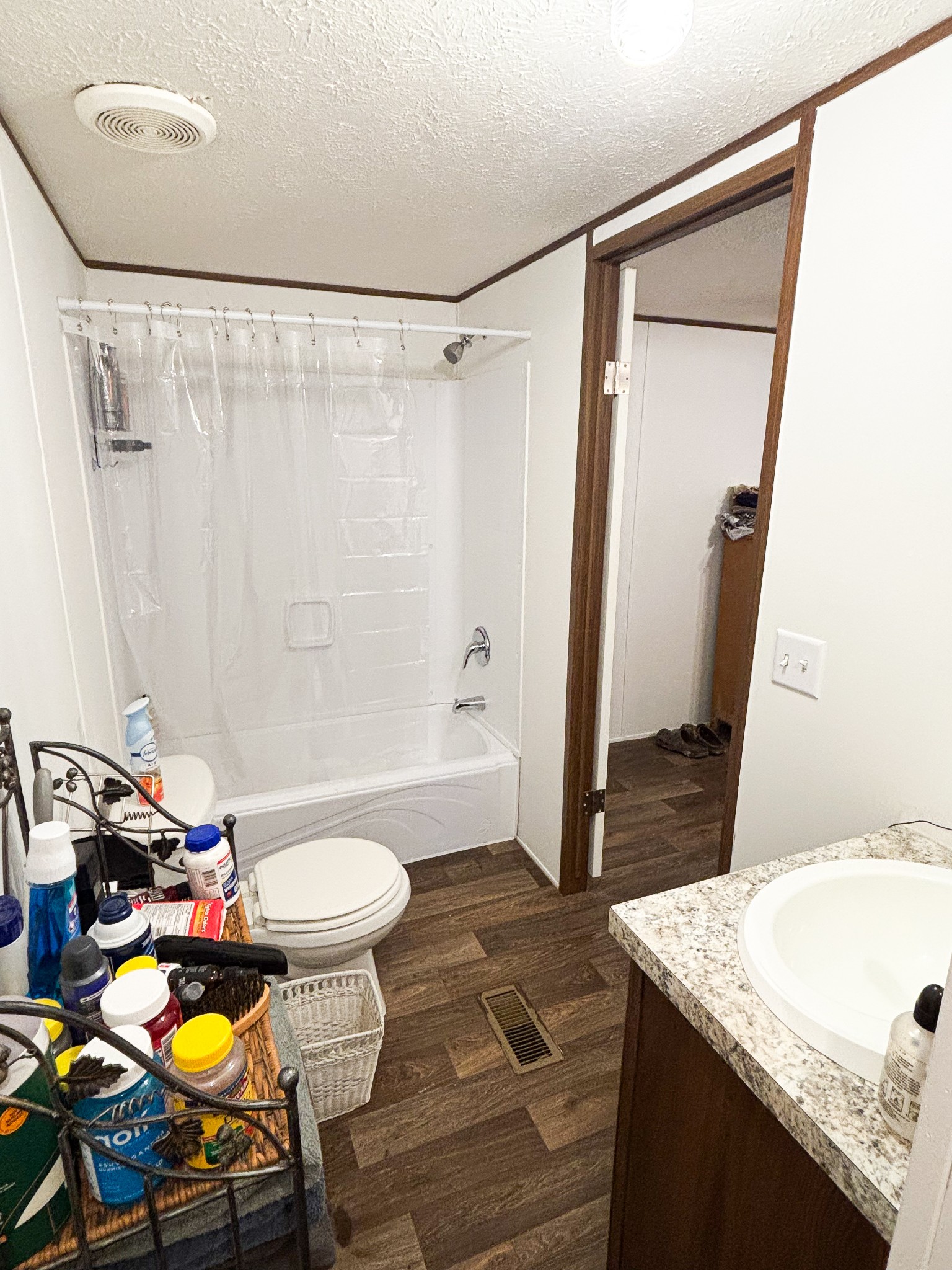 177 Quail Hollow Road Summertown, TN 38483 - Photo 11 of 15 a bathroom with a sink toilet and shower