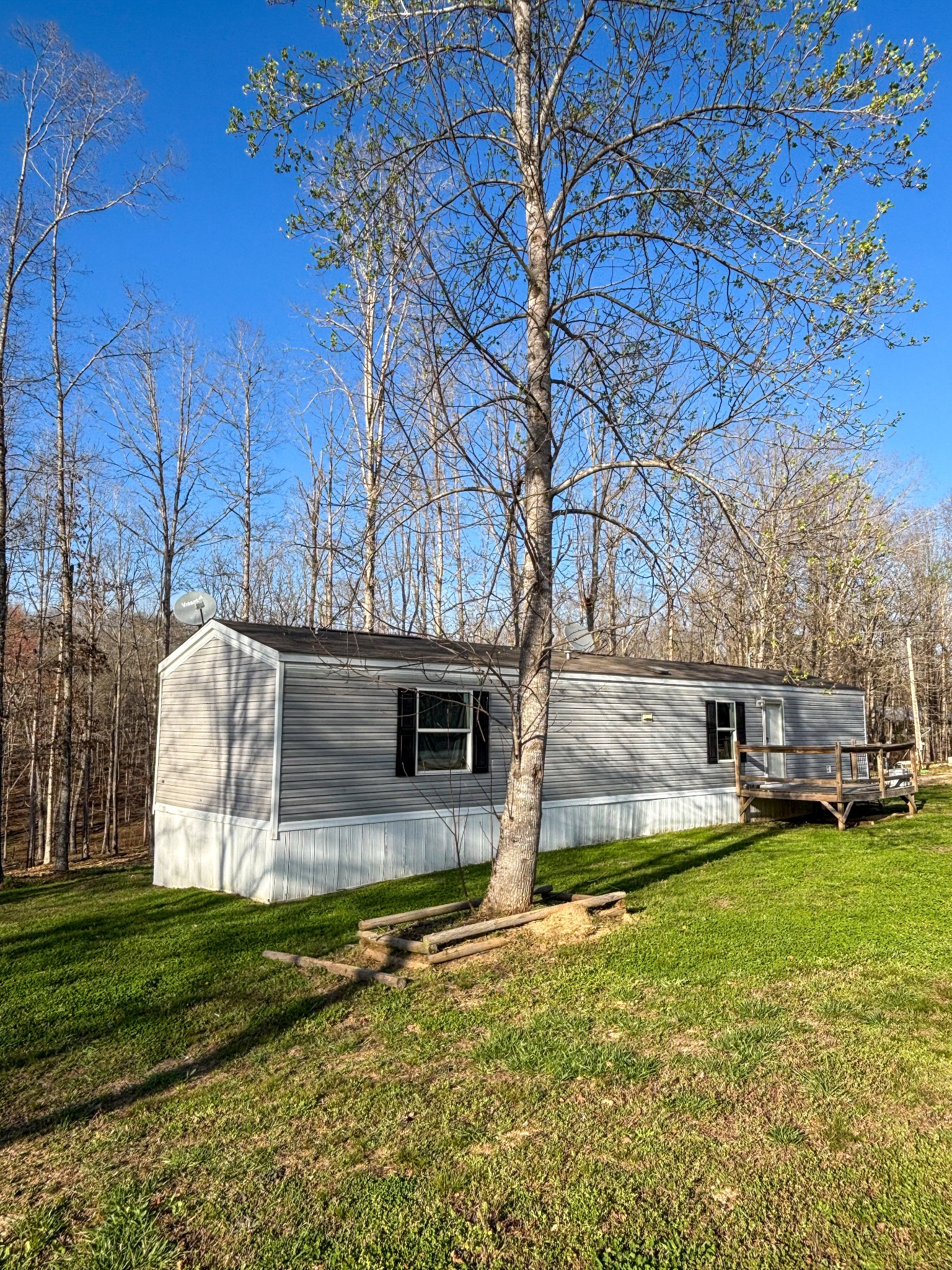 177 Quail Hollow Road Summertown, TN 38483 - Photo 3 of 15 a view of a house with a backyard