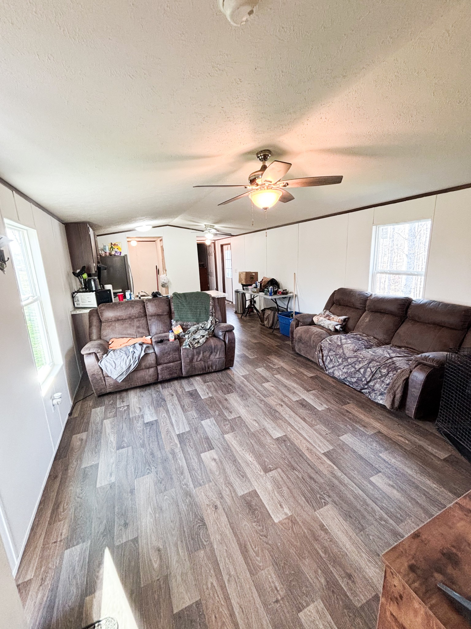 177 Quail Hollow Road Summertown, TN 38483 - Photo 5 of 15 a living room with furniture and a chandelier