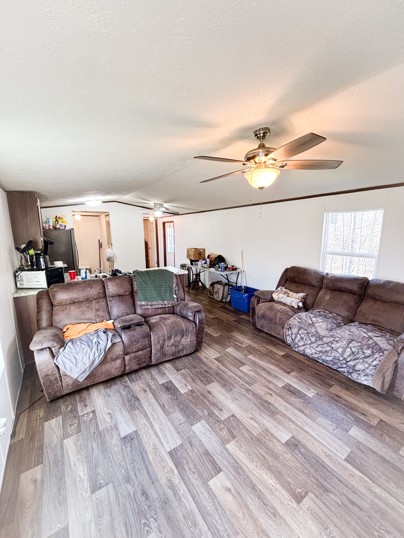 177 Quail Hollow Road Summertown, TN 38483 - Photo 6 of 15 a living room with furniture and a large window