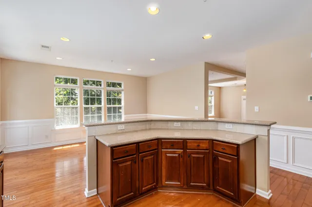 a kitchen with a sink and a window