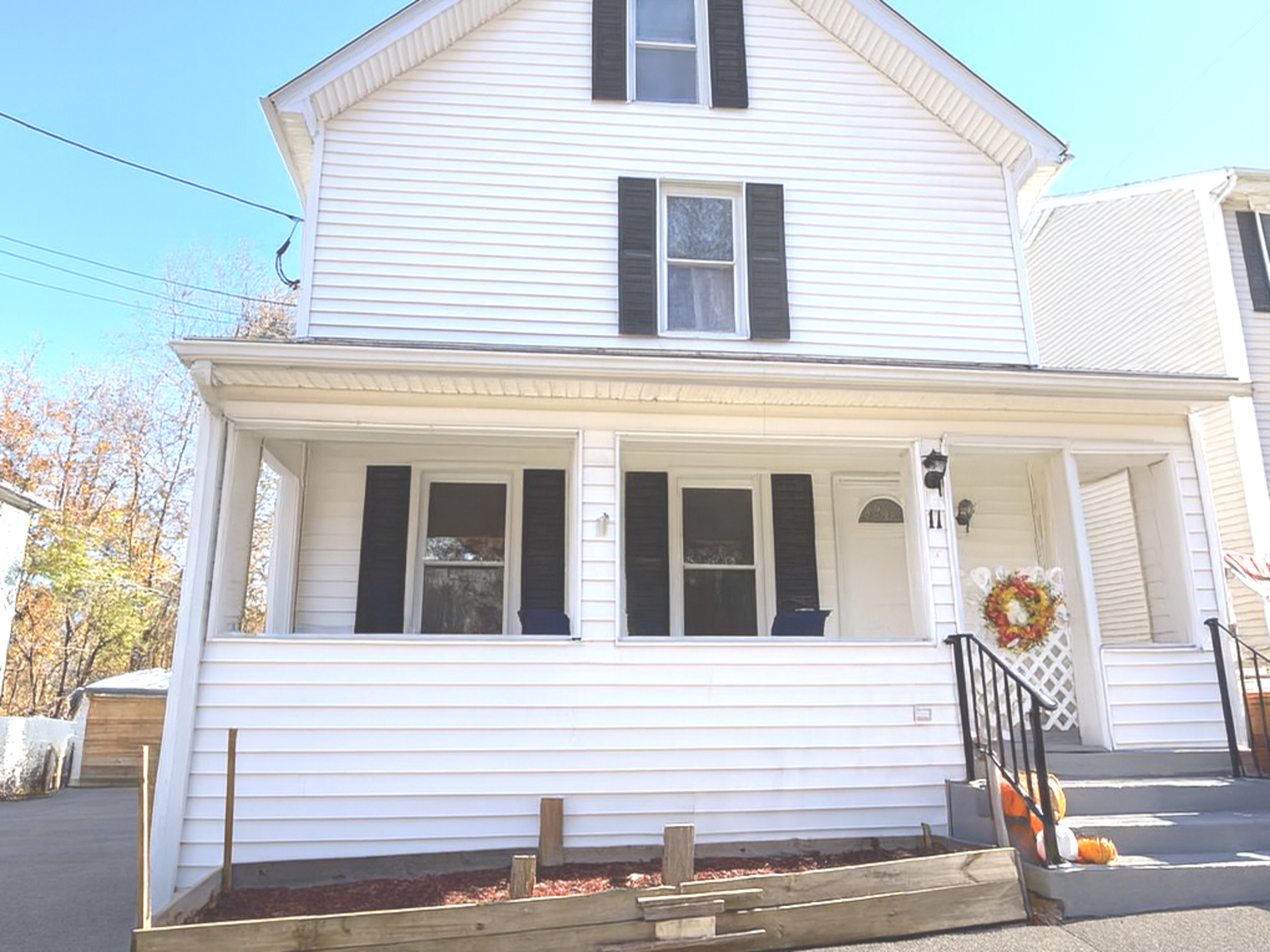 11 Mt Pleasant Street Shelton, CT 06484 - Photo 23 of 23 a view of a house with more windows and wooden fence