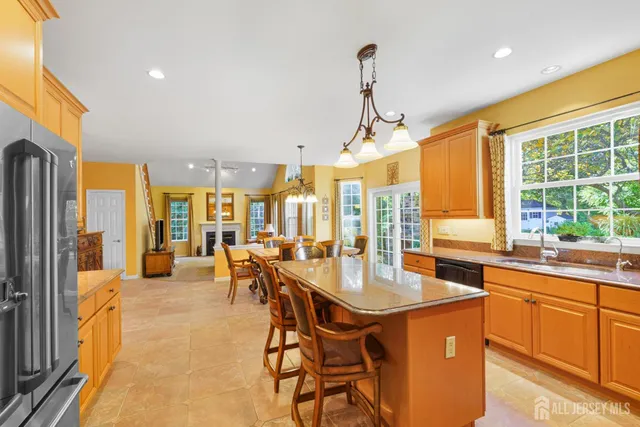 a very nice looking kitchen with a large window