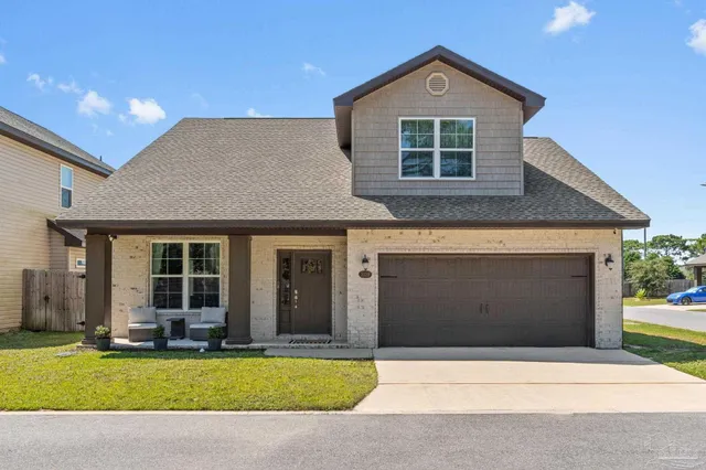 a view of pool with yard