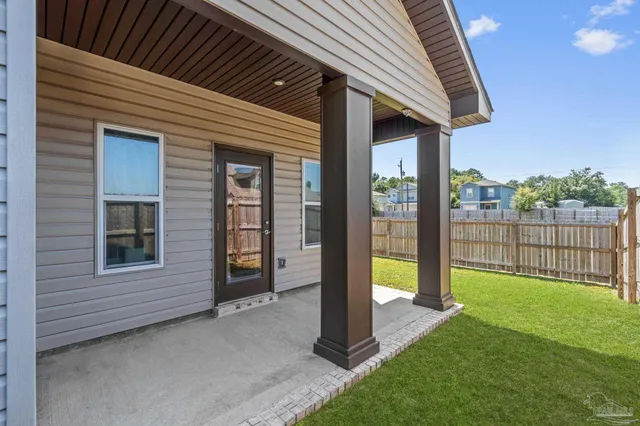 a view of a porch with a backyard