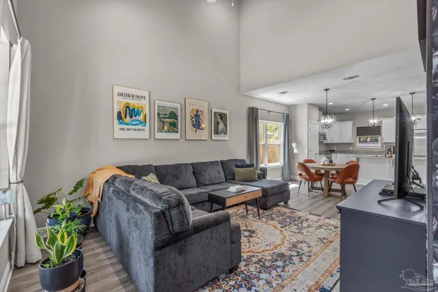 a living room with furniture and a couch