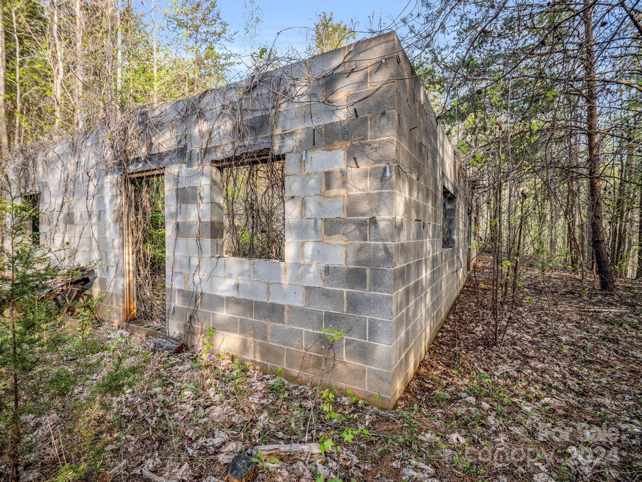 0 Equestrian Drive Ellenboro, NC 28040 - Photo 13 of 29 a view of a brick house with a yard