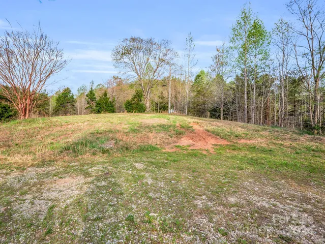 a fire hydrant in the middle of a field