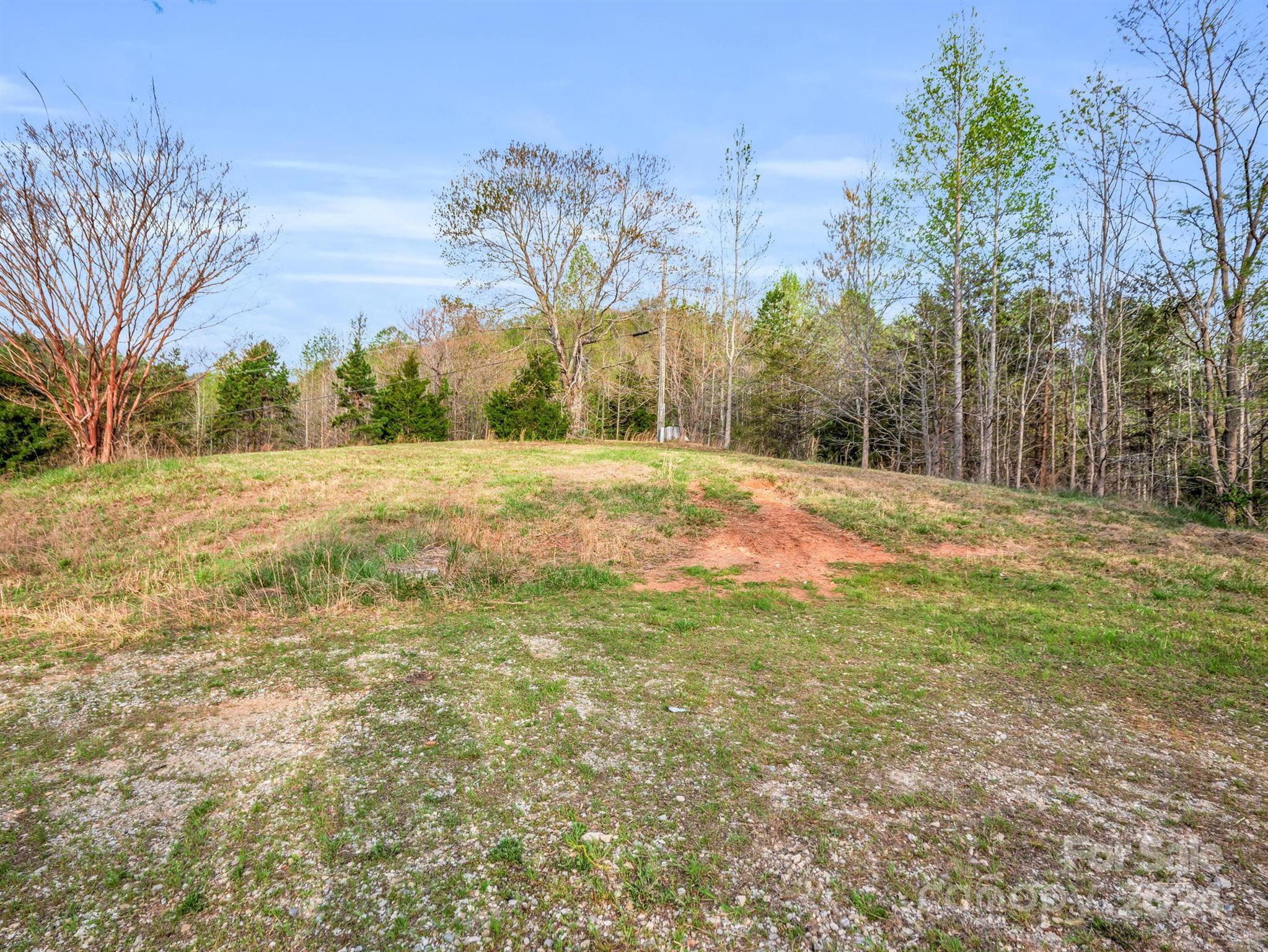 0 Equestrian Drive Ellenboro, NC 28040 - Photo 2 of 29 a fire hydrant in the middle of a field