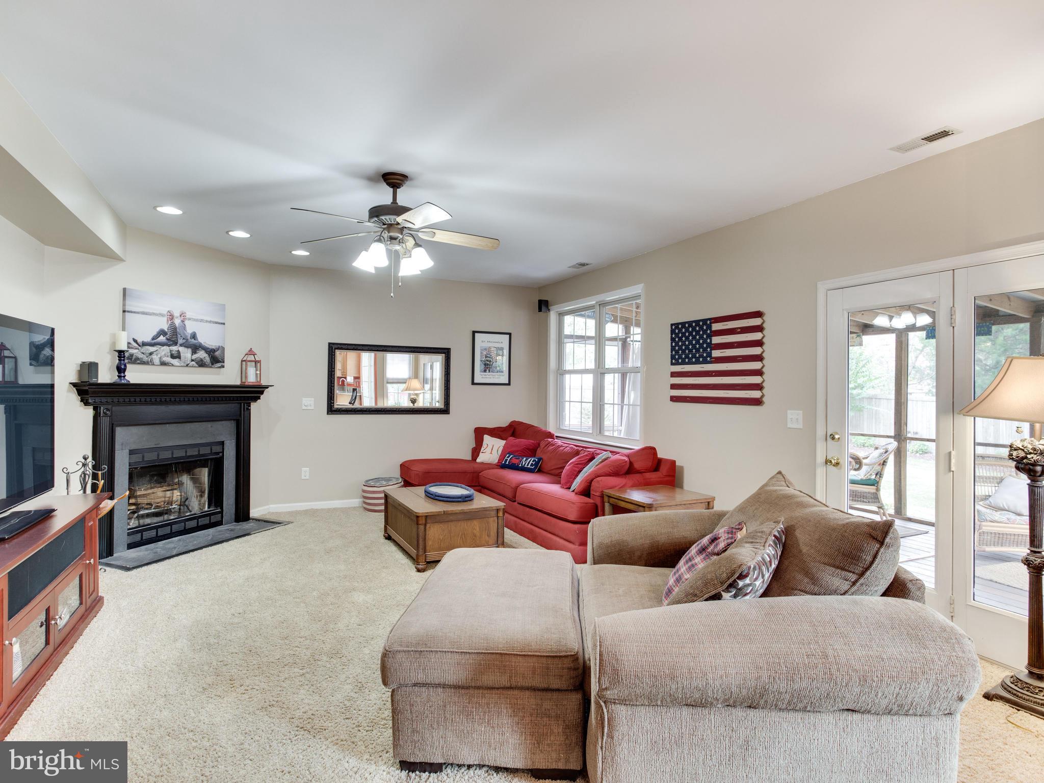 1496 Warfield Road Edgewater, MD 21037 - Photo 5 of 30 Large family room with fireplace