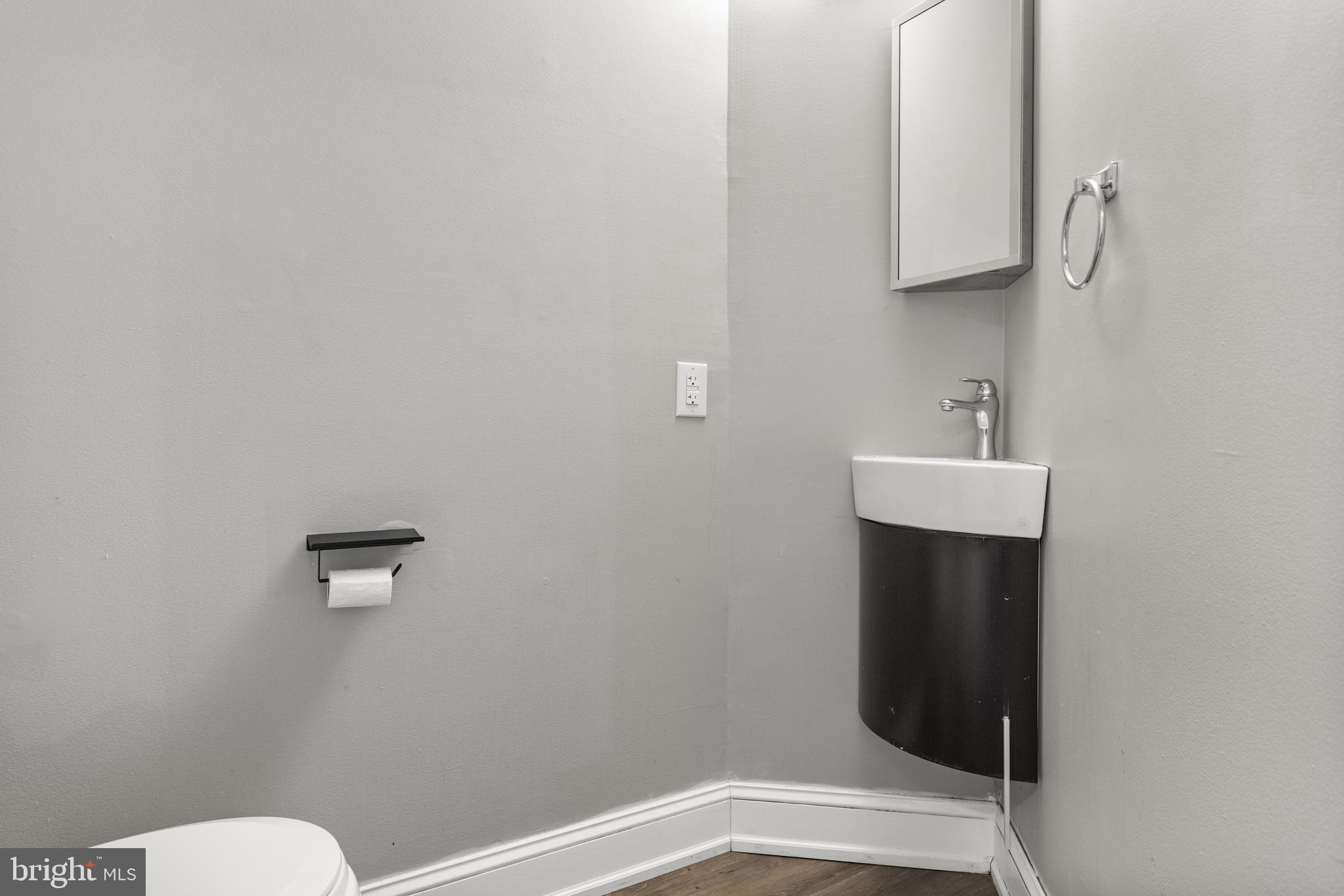 118 Suburban Boulevard Delran, NJ 08075 - Photo 17 of 36 a bathroom with a sink and a toilet