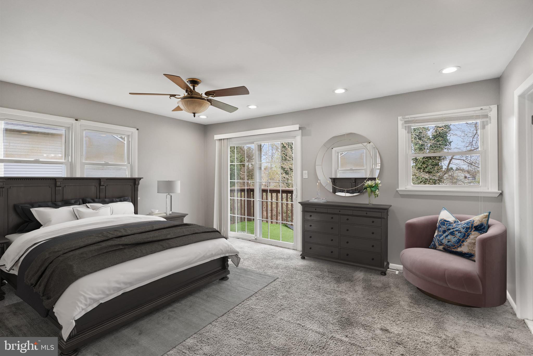 118 Suburban Boulevard Delran, NJ 08075 - Photo 18 of 36 a bedroom with a balcony a bed and a couch