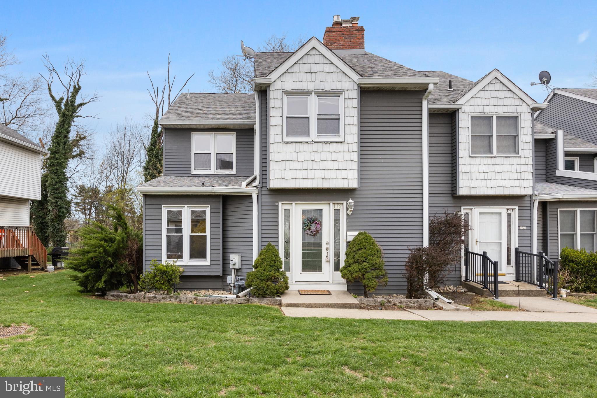 118 Suburban Boulevard Delran, NJ 08075 - Photo 2 of 36 a front view of a house with a yard