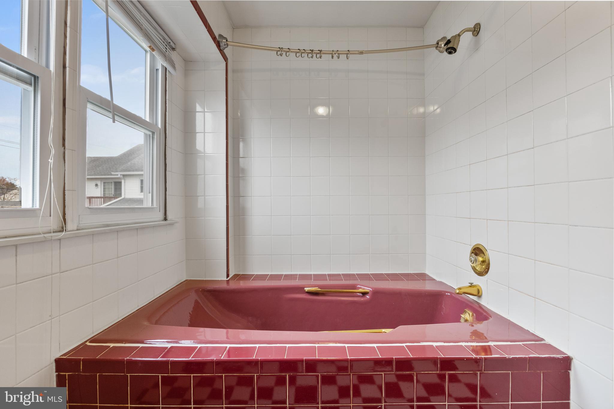 118 Suburban Boulevard Delran, NJ 08075 - Photo 27 of 36 a room with a bed and a window