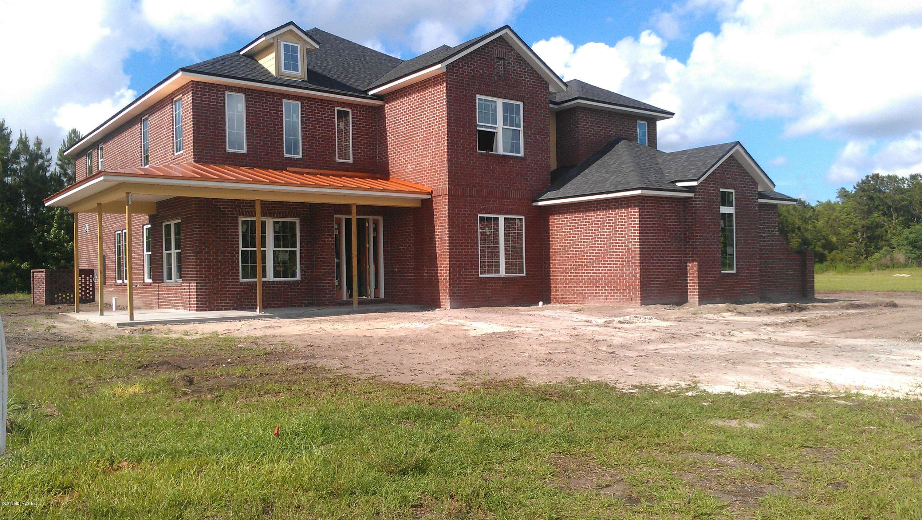7752 Collins Grove Road Jacksonville, FL 32256 - Photo 2 of 10 Full Brick Elevation