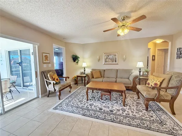 a kitchen with stainless steel appliances granite countertop a stove top oven a sink and cabinets