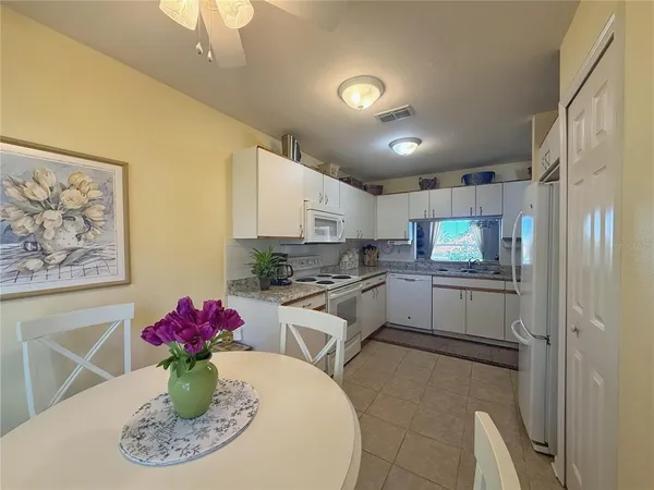 a view of a living room and dining room