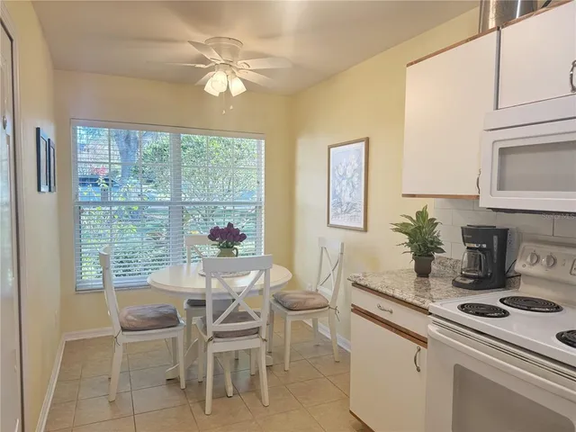 a bedroom with a large bed and a dresser