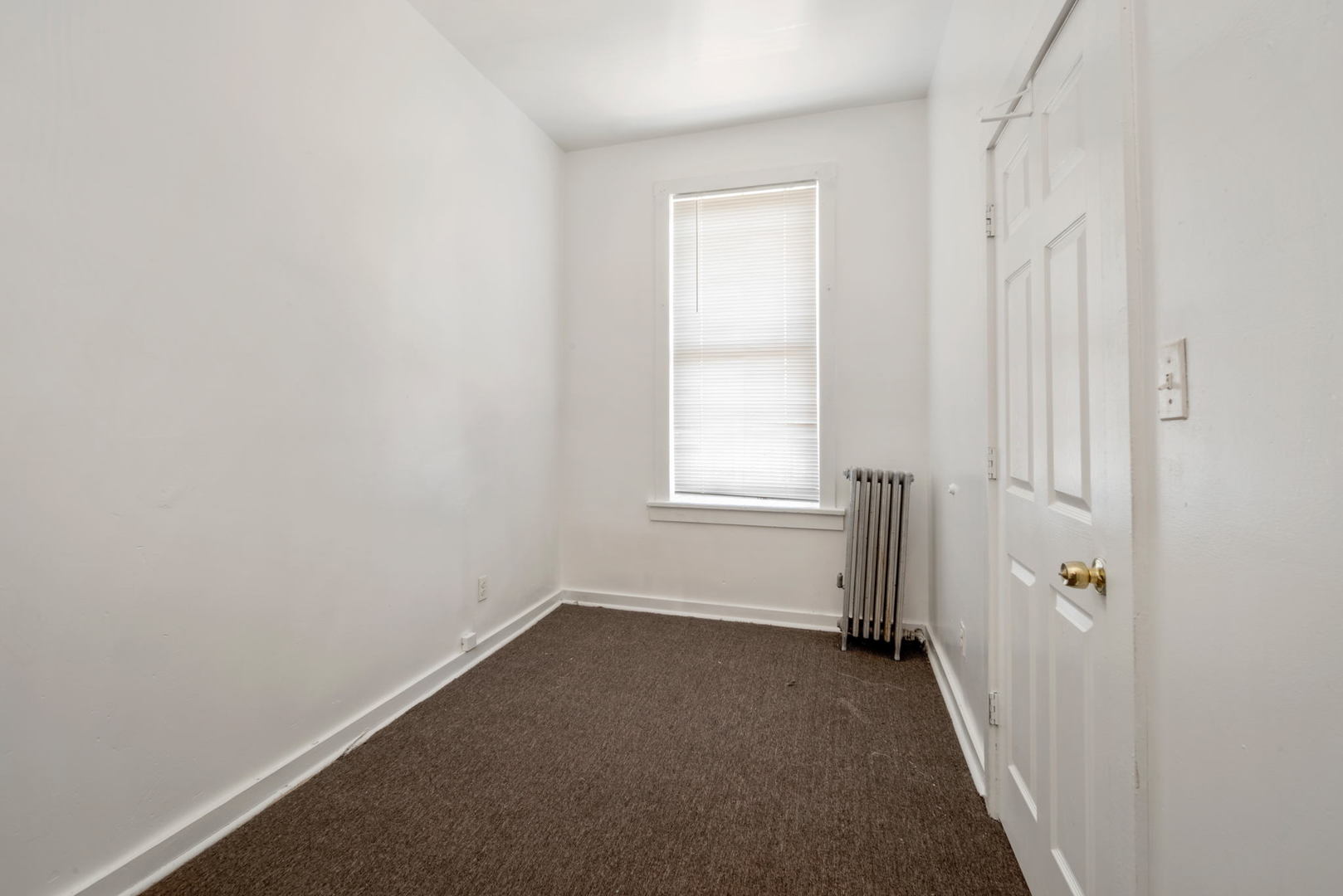 1455 South Avers Avenue Chicago, IL 60623 - Photo 17 of 22 a view of a room with a window