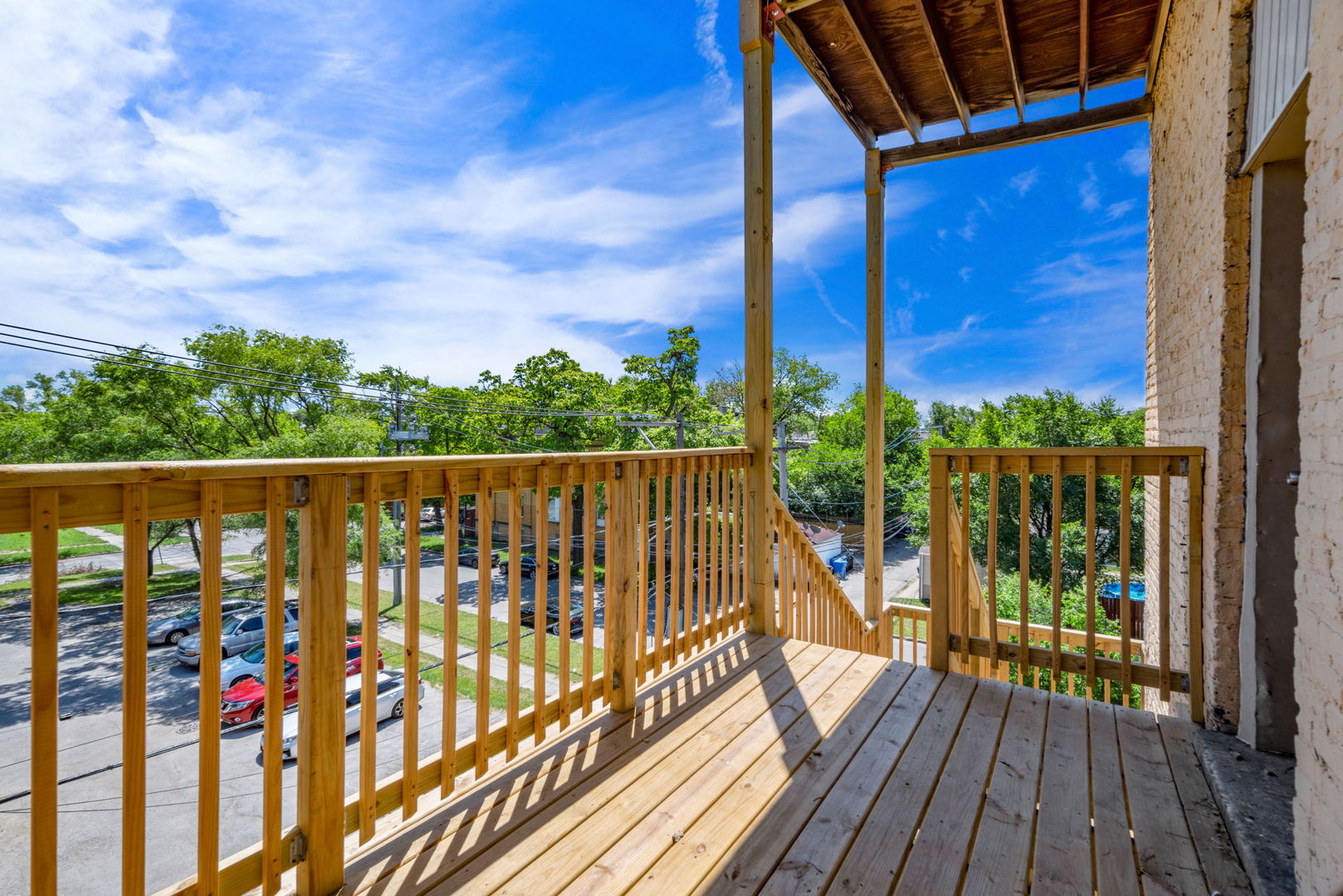 1455 South Avers Avenue Chicago, IL 60623 - Photo 20 of 22 a balcony with wooden floor
