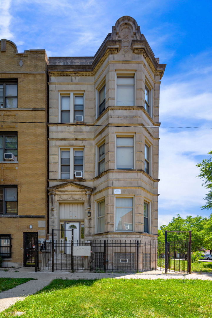 1455 South Avers Avenue Chicago, IL 60623 - Photo 3 of 22 a brick building that has a lots of windows in it